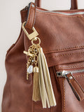 Gold beaded shell bag charm with tassel and pearls, imported from UK