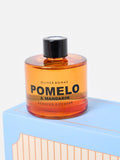 Oliver Bonas reed diffuser trio with Fig, Pomelo, and Rose fragrances, imported from the UK