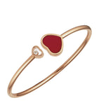 Chopard Happy Hearts rose gold bangle with moving diamond, imported from the UK