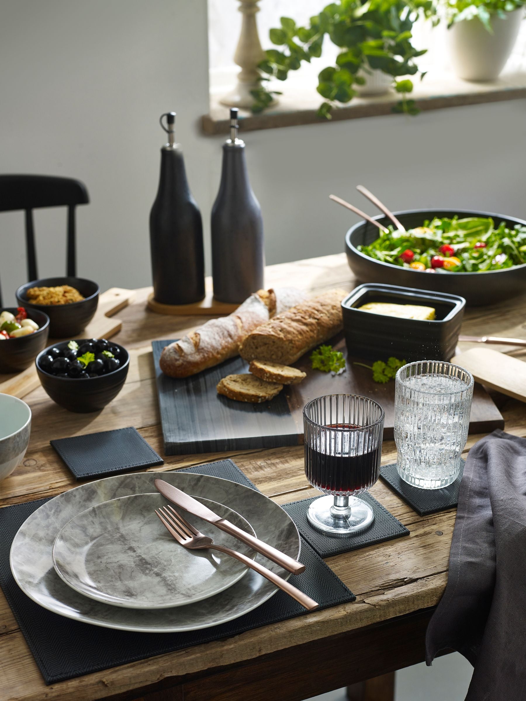 Black reversible faux leather placemats and coasters set of 4 (British brand)