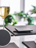 Black reversible faux leather placemats and coasters set of 4 (British brand)