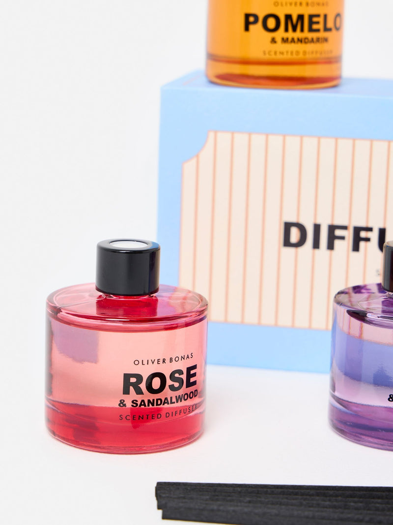 Oliver Bonas reed diffuser trio with Fig, Pomelo, and Rose fragrances, imported from the UK