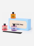 Oliver Bonas reed diffuser trio with Fig, Pomelo, and Rose fragrances, imported from the UK