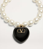 Valentino Garavani Coeur Royal beaded bracelet with heart pendant, imported from the UK