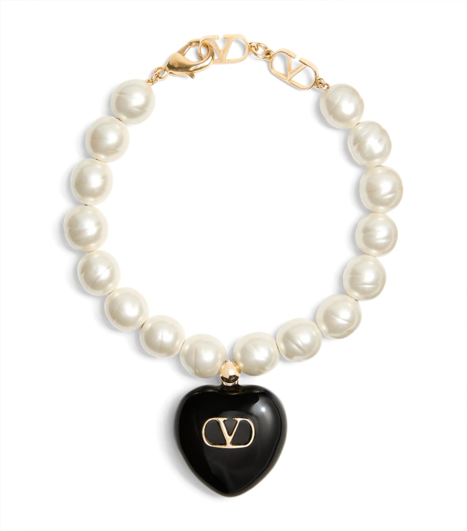 Valentino Garavani Coeur Royal beaded bracelet with heart pendant, imported from the UK